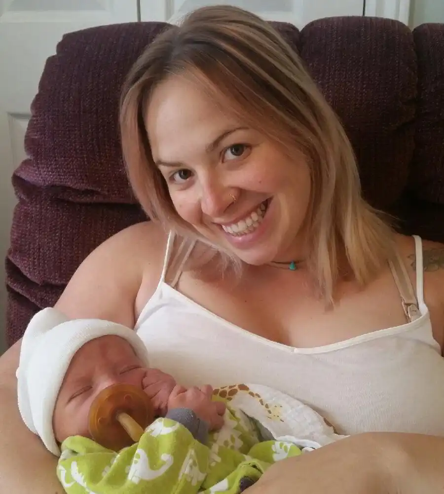 Meaghan holding her newborn son